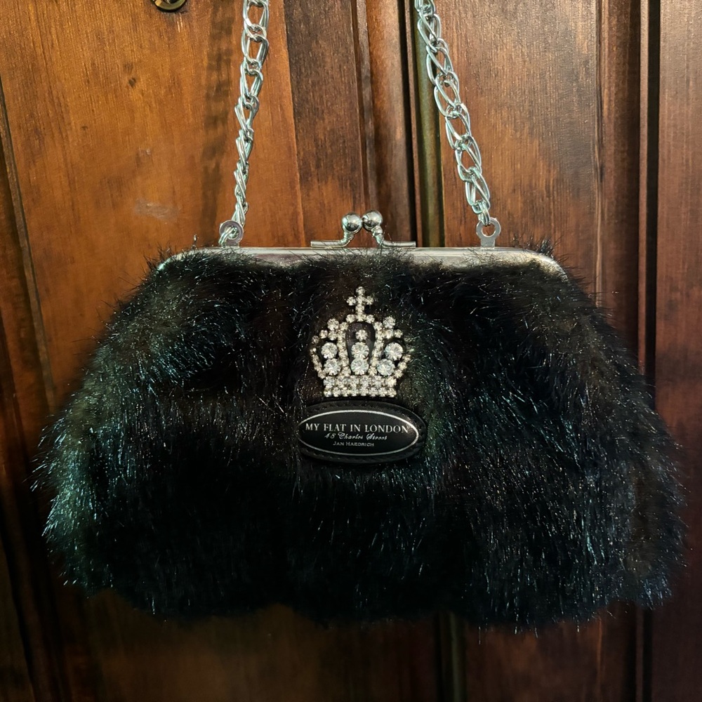 Super cute evening purse. I used it once. In mint condition. 9 x 6 inches.